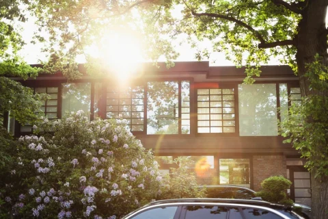 House with large windows in strong afternoon sun